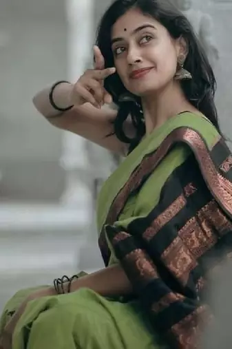 Elegant olive green traditional silk blend saree
