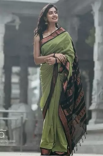 Elegant olive green traditional silk blend saree