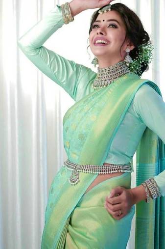 Mint green elegant woven silk blend saree