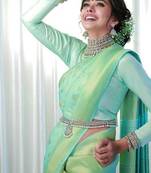 Mint green elegant woven silk blend saree
