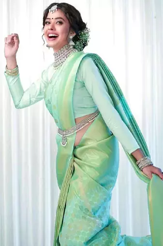 Mint green elegant woven silk blend saree