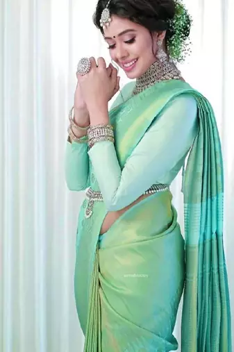 Mint green elegant woven silk blend saree
