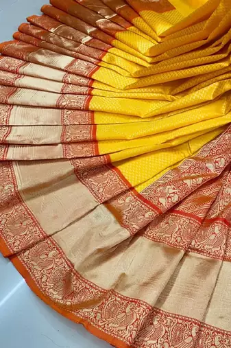 Bright yellow traditional silk blend saree