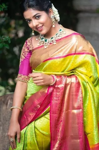 Traditional green pink silk blend saree