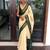 Traditional cream green border silk blend saree