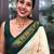 Traditional cream green border silk blend saree