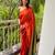 Vibrant orange traditional silk blend saree