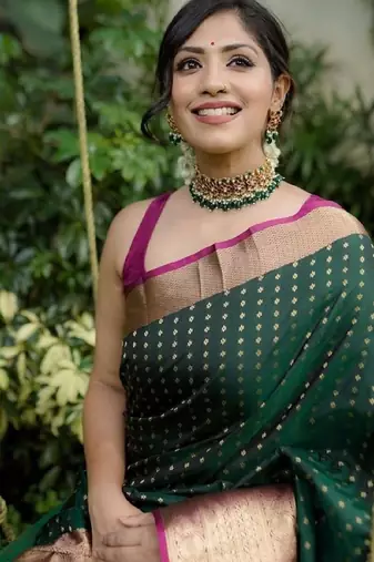Elegant dark green traditional silk blend saree