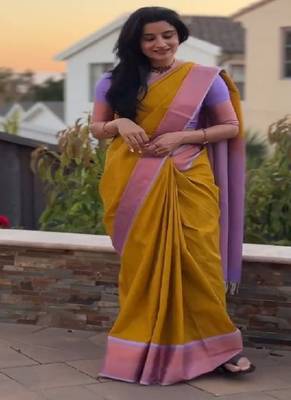 mustard yellow silk blend contrast border saree 1