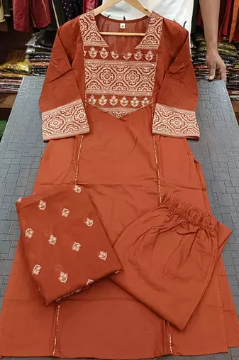 Beautiful jaipuri a women's rust orange cotton printed kurti set with a dupatta