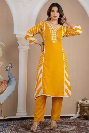 Beautiful jaipuri a yellow lehriya printed indian kurta set with a matching dupatta and pants