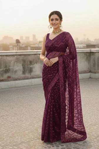 Wine  color sequence zig zag pattern all over work Georgette silk saree 