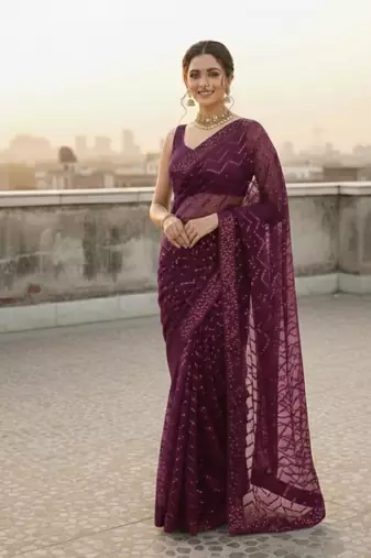 Wine  color sequence zig zag pattern all over work Georgette silk saree 