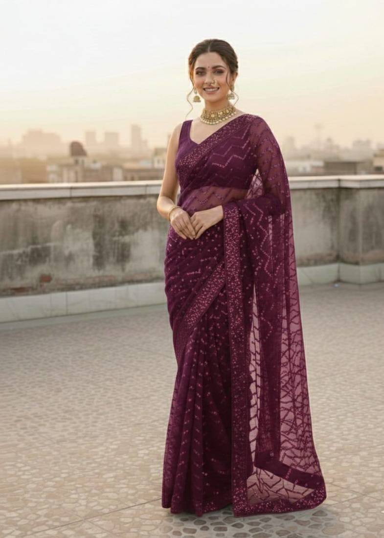 Wine  color sequence zig zag pattern all over work Georgette silk saree 