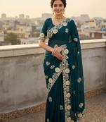 Teal color embroidery work and multi Thread work with arco cut work vichitra Saree