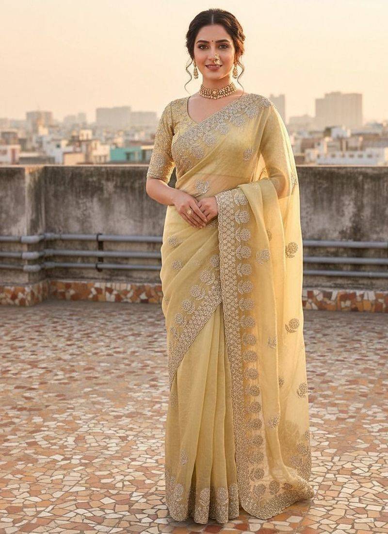 Light Yellow embroidery work and all over sarees butta work with cutwork border work satin Saree