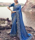 Blue satin with jacquard butti, sequince work , heavy embroidery & khatli work saree