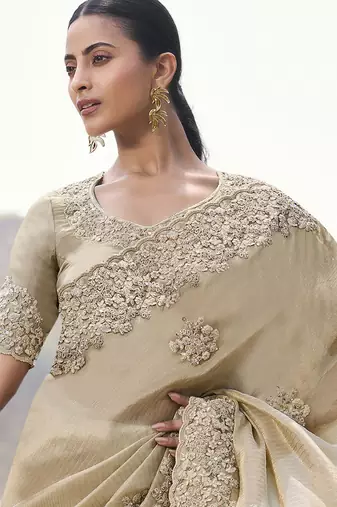 Beige tissue with jacquard butti, sequince work , heavy embroidery & khatli work saree