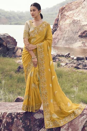 Yellow tissue with jacquard, sequince work , heavy embroidery & khatli work saree