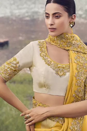 Yellow tissue with jacquard, sequince work , heavy embroidery & khatli work saree