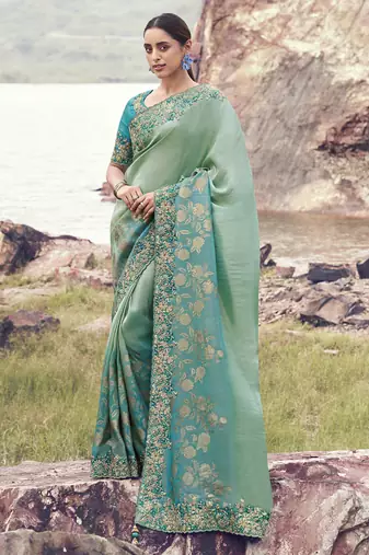 Turquoise bhagalpuri tissue, sequince work , heavy embroidery & khatli work saree