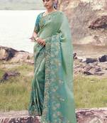 Turquoise bhagalpuri tissue, sequince work , heavy embroidery & khatli work saree
