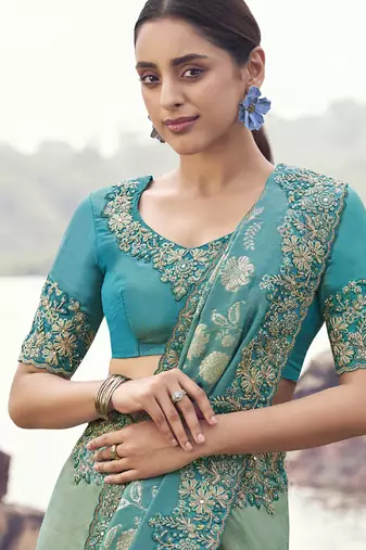 Turquoise bhagalpuri tissue, sequince work , heavy embroidery & khatli work saree