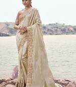 Cream satin silk, sequince work, heavy embroidery & khatli work saree