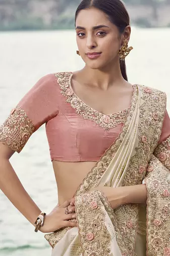 Cream satin silk, sequince work, heavy embroidery & khatli work saree