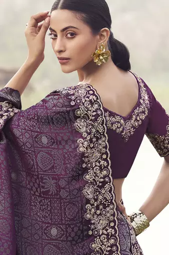 Wine satin with jaquard, sequince work, heavy embroidery & khatli work saree