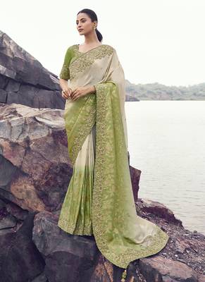 Shaded off-white & olive tissue with jaquard, sequince work, heavy embroidery & khatli work saree 1