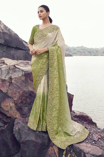 Shaded off-white & olive tissue with jaquard, sequince work, heavy embroidery & khatli work saree