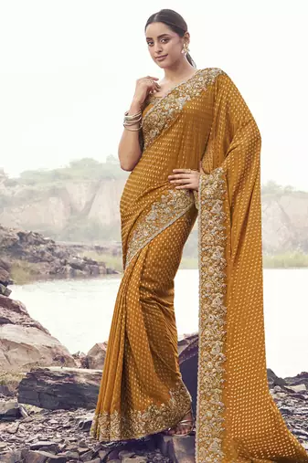 Copper satin with jaquard sequince work, heavy embroidery & khatli work saree
