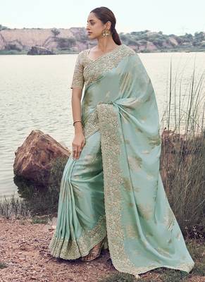 Light turquoise tissue with jaquard, sequince work , heavy embroidery & khatli work saree 1