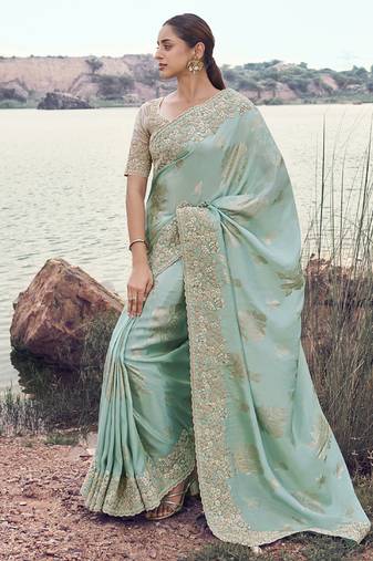 Light turquoise tissue with jaquard, sequince work , heavy embroidery & khatli work saree