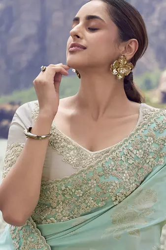 Light turquoise tissue with jaquard, sequince work , heavy embroidery & khatli work saree