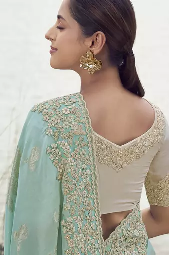 Light turquoise tissue with jaquard, sequince work , heavy embroidery & khatli work saree
