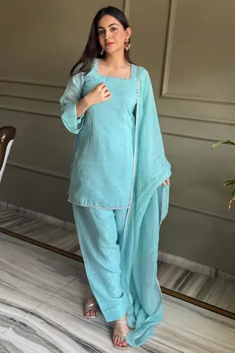 Sky blue crunchy silk kurta salwar set with swarovski crystal work and lace border dupatta