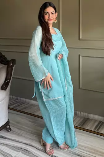 Sky blue crunchy silk kurta salwar set with swarovski crystal work and lace border dupatta