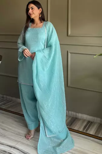 Sky blue crunchy silk kurta salwar set with swarovski crystal work and lace border dupatta