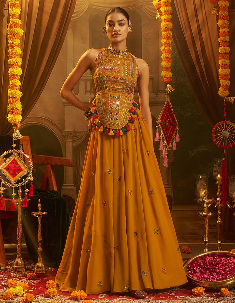 Mustard Yellow Georgette Lehenga with Hand Embroidered Halter Blouse and Tassel Shell Detail