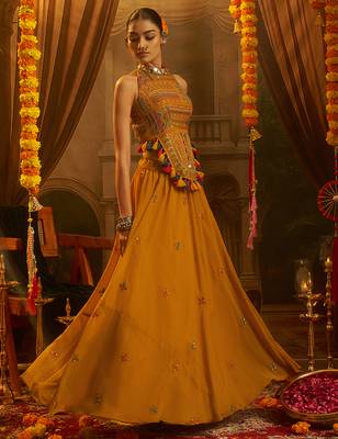 Mustard Yellow Georgette Lehenga with Hand Embroidered Halter Blouse and Tassel Shell Detail 2