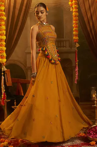 Mustard Yellow Georgette Lehenga with Hand Embroidered Halter Blouse and Tassel Shell Detail