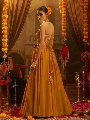 Mustard Yellow Georgette Lehenga with Hand Embroidered Halter Blouse and Tassel Shell Detail 3
