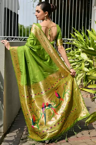 Parrot green soft banarasi silk blend paithani saree with rich zari & meena woven shiny pallu zari butties & tassels