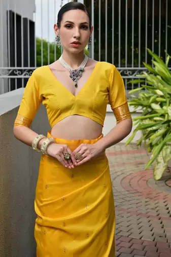 Yellow soft banarasi silk blend paithani saree with rich zari & meena woven shiny pallu zari butties & tassels
