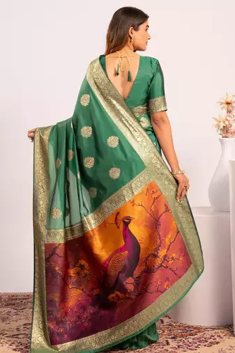 Green extraordinary banarasi silk blend saree with resham weave peacock pallu & zari border