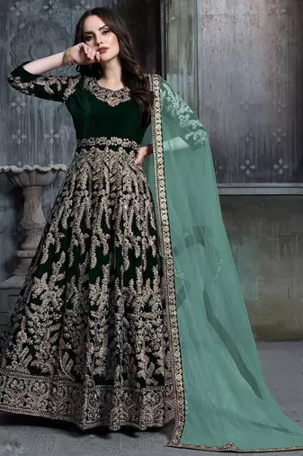 Green velvet zari work semi stitched size up to 42 salwar suits