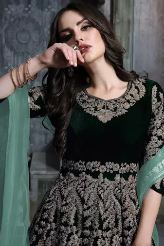 Green velvet zari work semi stitched size up to 42 salwar suits