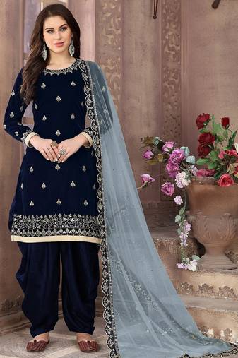 Dark green velvet zari work semi stitched size up to 42 salwar suits